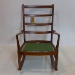 A Parker Knoll wooden rocking chair frame H: 94 x W: 65 x 85cm