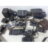 A collection of vintage camera's and accessories to include Yashica and Minolta