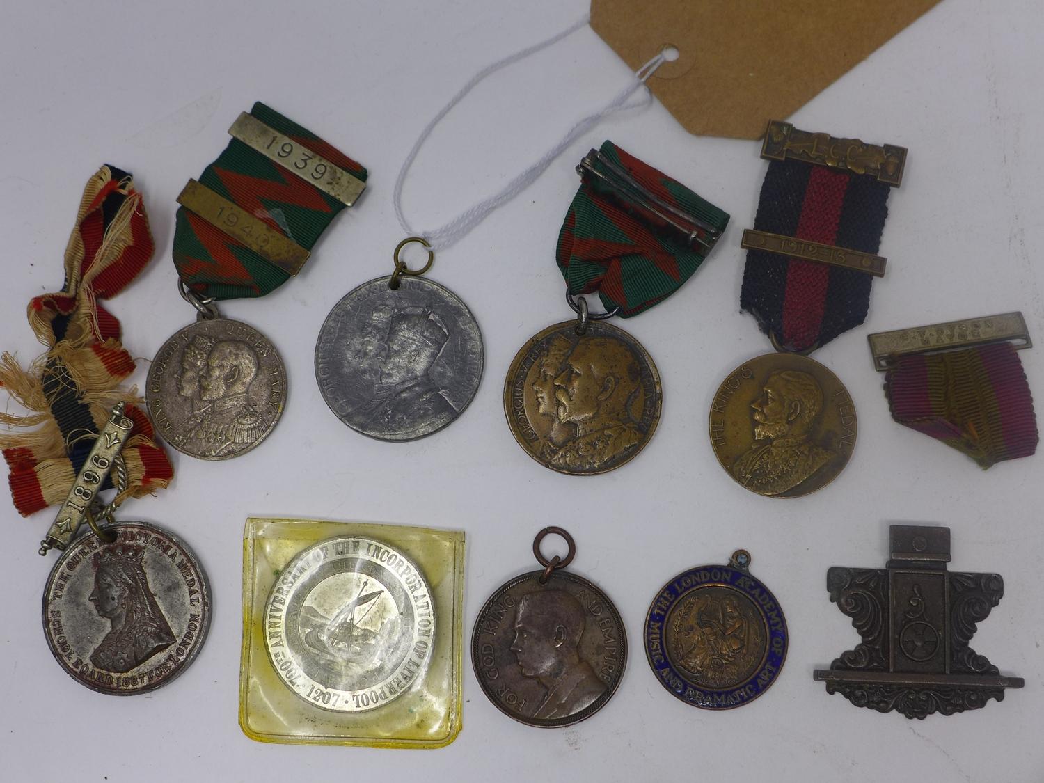 A collection of nine assorted medals (9)