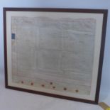 A framed and glazed antique indenture, 63 x 73cm