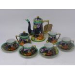 A Noritake porcelain coffee set comprising of coffee pot H: 17cm, sugar bowl H: 9cm, milk jug H: 7cm