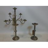 A silver plated four branch five light candelabra, with floral scrolling branches on knopped stem,