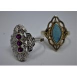 Two sterling silver rings: one set with a turquoise Size: M 1/2 the other in an Art Deco style set