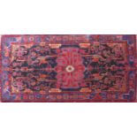 A North West Persian Nahawand rug, central diamond medallion with repeating petal motifs on a
