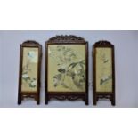 An early 20th century Chinese hardwood 3 fold table screen, with pained panels on linen, signed,