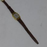 A Raymond Weil 18k gold electroplated ladies wristwatch, dual tone dial, on a Hirsch Lizardgrain