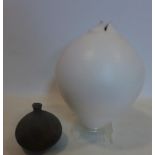 A large studio pottery vase on perspex stand, marked K.P.M to base together with a small vase by