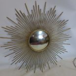 A contemporary sun burst mirror, with circular convex glass plate, having label for 'Two's