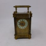 An early 20th century brass carriage clock, H.15 W.8 D.7cm