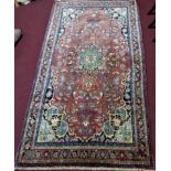 A Northwest Persian Bidjar carpet with central double pendant medallion with repeating petal