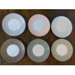 JL Coquet, France, a set of 6 porcelain plates in the Jaune de Chrome design with each plate