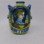 A 20th century majolica hand-painted vase decorated with the profile of a Renaissance lady,