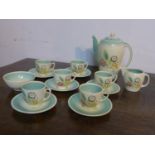 An Art Deco Susie Cooper coffee set: coffee jug H: 19cm, milk jug, sugar bowl and 6 cups and saucers