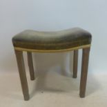 A George VI Coronation stool, with concave velvet rectangular seat, raised on square canted limed