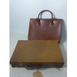 A Gucci leather bag with shoulder strap, together two briefcases (3)