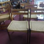 A set of six Mid 20th century Danish teak dining chairs, with woven seats