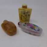 Three Chinese snuff bottles to include a carved horn erotic example 7 x 4cm with two hand-painted