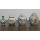 Three Chinese porcelain and hand-enamelled ginger jars, H: 12cm, 12cm and 10cm with a miniature vase