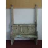 A distressed painted church pew, H.172 W.115 D.50cm