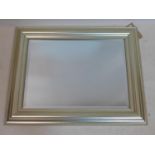 A contemporary silver/gilt painted wall mirror, bevelled glass plate and beaded frame, 79 x 62cm