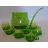 A mid-century, hand-blown green glass punch bowl with matching ladle and 6 glasses, Punch bowl: 19.5