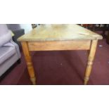 A 19th century Irish pine kitchen table, c.1860, on turned legs, H.72 W.136 D.86cm