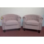 A pair of tub chairs with studded pink upholstery, on square tapered feet