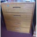 A mid-century teak chest of 4 drawers, H: 61 x W: 51 x D: 51cm, with key
