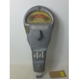 A vintage American parking meter by Rockwell international