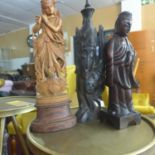 Three hand-carved Oriental hardwood sculptures of females, 30 x 10cm, 25 x 7cm and 29 x 8cm