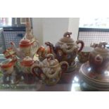 A Japanese porcelain coffee set with coffeepot, 6 cups and saucers, milk jug and sugar bowl with