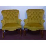 A pair of contemporary armchairs with gold velvet button back upholstery, H.98cm (2)