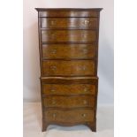A walnut serpentine chest on chest, with 7 graduating drawers and brushing slide, H.156 W.76 D.44cm