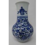 A 19th century Chinese blue & white porcelain vase with floral decoration, small chip to rim and