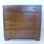 A mahogany chest of four graduated drawers, raised on block feet, H.74 W.75 D.46cm