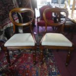 A set of six Victorian mahogany balloon back dining chairs