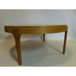 A 20th century light oak circular coffee table, H.41 D.90cm