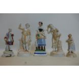 A collection of five 19th century porcelain figurines, to include a Staffordshire example of lady