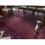 A contemporary bent glass coffee table, H.44 W.119 D.60cm