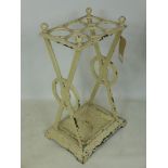 A 19th century, cream-painted cast iron umbrella and stick stand, H: 64 x W: 37 x D: 28cm