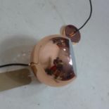 A copper ceiling light pendant