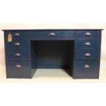 A 20th century blue painted desk with 9 drawers, H.80 W.157 D.66cm