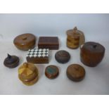 A collection of 10 wooden boxes/trinket boxes to include a hand-carved example and a box with