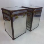 A pair of aviator mirrored trunks, leather and stud bound, H.70 W.45 D.45cm (2)