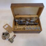 An early 20th, oak-cased century lathe and drill bits stamped 'Lorch Schmidt & Co', box: 11 x 25 x