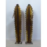 A pair of Maison Jansen style gilt sheet metal cactus stands, H.92cm