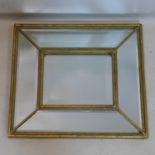 A gilt framed mirror with bevelled plates, 46 x 41cm