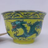 A Chinese yellow and green enamelled dragon bowl, with six character marks for Guangxu and applied
