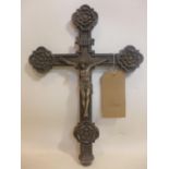 A large and weighty silver plated crucifix with rosettes and plaque with 'INRI' ('Jesus of Nazareth,