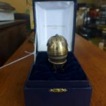 A boxed sterling silver egg and stand by St James House Collection set to the top with a circular